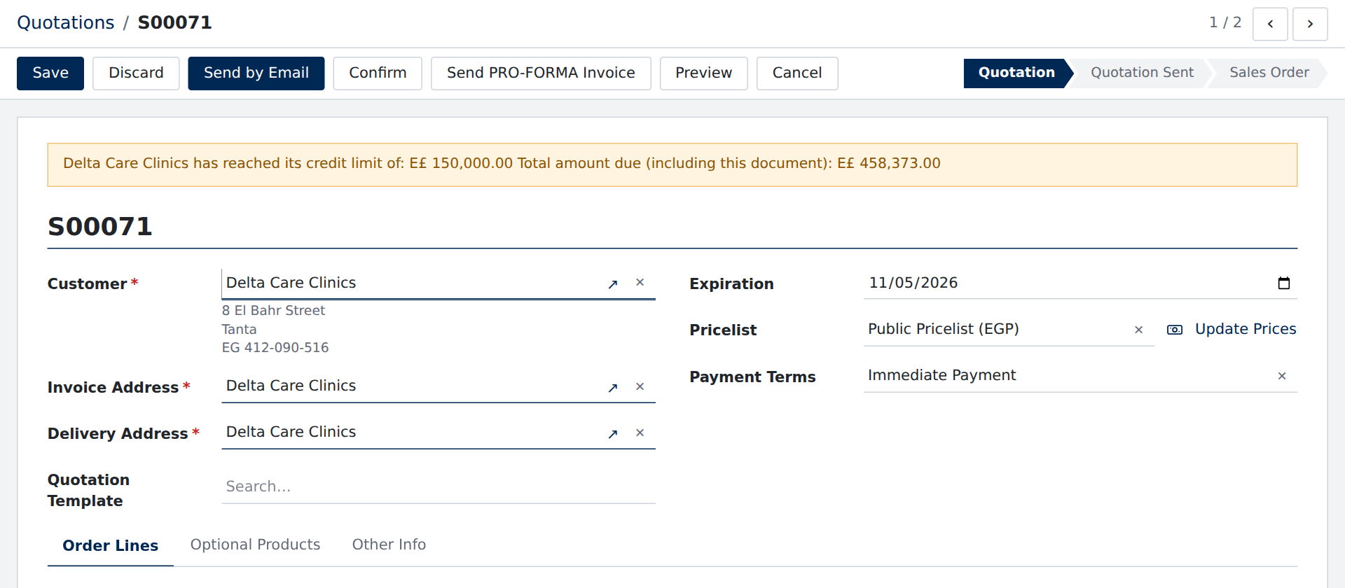 A quotation whose customer was changed to Delta Care Clinics: its addresses, pricelist and payment terms updated, and a credit-limit warning over the sheet